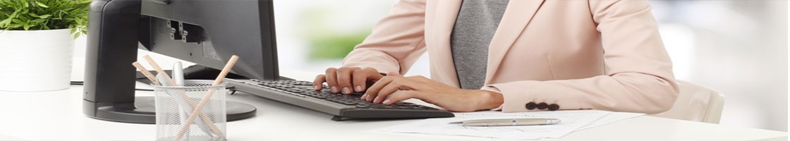 Woman typing on keyboard