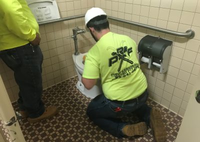 Man working on the water for the bathrooms