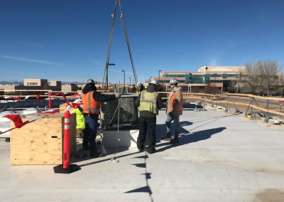 Men helping lift an object