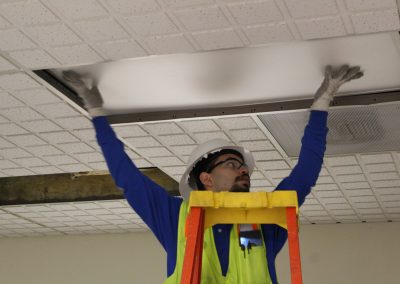 Man installing lighting