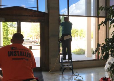 Man working on a window